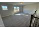 Bright bonus room with carpet and natural light at 445 Edison Rail Ln, Knightdale, NC 27545