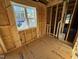 Under construction bathroom with window at 585 Husketh Rd, Youngsville, NC 27596