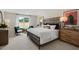 Spacious bedroom with king-size bed and large window at 246 Moore Creek Dr, Fuquay Varina, NC 27526