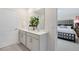 Double vanity bathroom with modern fixtures at 246 Moore Creek Dr, Fuquay Varina, NC 27526