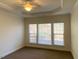 Main bedroom with hardwood floor, window and ceiling fan at 202 Beckingham Loop, Cary, NC 27519