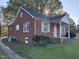 Brick ranch house with a covered porch, side view at 2222 Sunset Hills Dr, Burlington, NC 27215