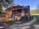 Rear view of brick ranch house at 2222 Sunset Hills Dr, Burlington, NC 27215