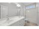 Bathroom includes a double vanity, a tub shower combo, and tile flooring at 7667 Briar Creek Rd, Rocky Mount, NC 27803