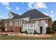 Brick house with a large backyard and deck at 7667 Briar Creek Rd, Rocky Mount, NC 27803