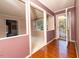 Entryway with wood flooring and a view into the living room at 1 Westbury Pl, Durham, NC 27707