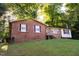 Brick ranch home with a spacious yard at 1 Westbury Pl, Durham, NC 27707