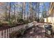 Wooden deck with wooded views and grill at 345 Thornwood Ln, Youngsville, NC 27596