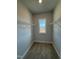 Walk-in closet with wire shelving and a window at 441 Edison Rail Ln, Knightdale, NC 27545