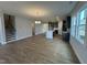 Open concept dining room with hardwood floors and kitchen views at 441 Edison Rail Ln, Knightdale, NC 27545