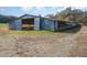 Long, rustic chicken coop at 739 Silk Hope Lindley Mill Rd, Siler City, NC 27344
