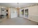 Dining room with built-in hutch and access to a sunroom with a view at 739 Silk Hope Lindley Mill Rd, Siler City, NC 27344