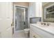 Bathroom features a shower/tub combo and updated vanity at 739 Silk Hope Lindley Mill Rd, Siler City, NC 27344