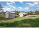 Property with detached garage, shed, and carport at 739 Silk Hope Lindley Mill Rd, Siler City, NC 27344