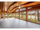 Sunroom boasts wood ceiling, tile floor, and scenic views at 739 Silk Hope Lindley Mill Rd, Siler City, NC 27344