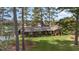 Brick ranch house with spacious lawn and mature trees at 739 Silk Hope Lindley Mill Rd, Siler City, NC 27344