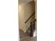 Elegant staircase with dark wood railing and banister at 3565 Kirkland Ct # 108, Burlington, NC 27217