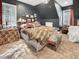 Bedroom with a king-size bed and eclectic decor at 1153 Four Wheel Dr, Wake Forest, NC 27587