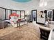 Bedroom with coral headboard, window seating and walk-in closet at 1153 Four Wheel Dr, Wake Forest, NC 27587