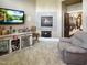Cozy living room with fireplace, built-ins, and comfy seating at 1153 Four Wheel Dr, Wake Forest, NC 27587