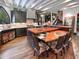 L-shaped kitchen boasts a spacious island with wood countertop and dark cabinetry at 1153 Four Wheel Dr, Wake Forest, NC 27587