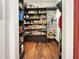 Well-stocked pantry with ample shelving for storage at 1153 Four Wheel Dr, Wake Forest, NC 27587