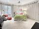 Bright bedroom with plush carpeting and ample natural light at 1153 Four Wheel Dr, Wake Forest, NC 27587