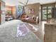 Spacious game room with comfortable seating and unique decor at 1153 Four Wheel Dr, Wake Forest, NC 27587