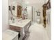 Bathroom with mosaic tile, walk-in shower, and decorative accents at 1153 Four Wheel Dr, Wake Forest, NC 27587