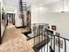 Unique hallway with spiral staircase and eclectic art at 1153 Four Wheel Dr, Wake Forest, NC 27587