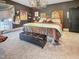Spacious main bedroom with plush carpet, large bed, and plenty of natural light at 1153 Four Wheel Dr, Wake Forest, NC 27587
