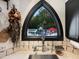 Kitchen features a window overlooking the pool and backyard at 1153 Four Wheel Dr, Wake Forest, NC 27587