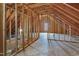 Unfinished bonus room with wood framing and flooring at 96 Abram Ct, Broadway, NC 27505