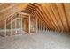 Unfinished bonus room with wood framing and flooring at 96 Abram Ct, Broadway, NC 27505