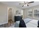 Main bedroom with ceiling fan and access to the bathroom and closet at 96 Abram Ct, Broadway, NC 27505