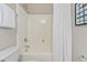 Clean bathroom with tub shower combo and white fixtures at 96 Abram Ct, Broadway, NC 27505