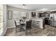 Modern kitchen with stainless steel appliances and dark brown cabinets at 96 Abram Ct, Broadway, NC 27505
