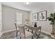 Bright home office with a desk and two chairs at 96 Abram Ct, Broadway, NC 27505