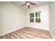 Spacious bedroom with hardwood floors and large windows at 831 Ridgeway Ave, Durham, NC 27701