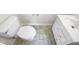 Small bathroom with toilet and vanity with sink at 1122 E Ellerbee St, Durham, NC 27704
