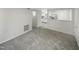Living room with view of kitchen and hallway at 1122 E Ellerbee St, Durham, NC 27704