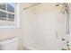 Clean bathroom with a shower/tub combo and window at 2129 Ventana Ln, Raleigh, NC 27604