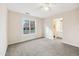 Bright bedroom with large window and en-suite bathroom access at 2129 Ventana Ln, Raleigh, NC 27604