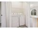 Laundry closet with washer and dryer at 2129 Ventana Ln, Raleigh, NC 27604