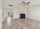 Living room features a fireplace and tile floors at 2129 Ventana Ln, Raleigh, NC 27604