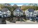 Three-unit townhouse aerial view, showing parking and landscaping at 2129 Ventana Ln, Raleigh, NC 27604
