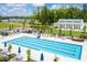 Community lap pool with surrounding lounge area at 2213 Pitchfork Ln, Durham, NC 27713