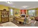 Bright and airy living room with hardwood floors, featuring a charming hutch at 1203 Lotus Lilly Dr, Durham, NC 27713