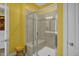 Bathroom with a walk-in shower and built-in bench seat at 1203 Lotus Lilly Dr, Durham, NC 27713