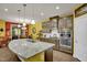Modern kitchen with granite island and dark brown cabinets at 1203 Lotus Lilly Dr, Durham, NC 27713
